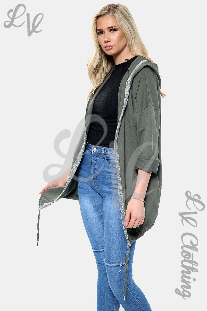 Dames Vest met capuchon en paillettenster op de rug kaki Stukprijs € 22,99
