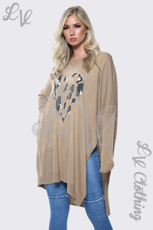 Tan oversize jumper with heart print, long sleeves, side-slit hem