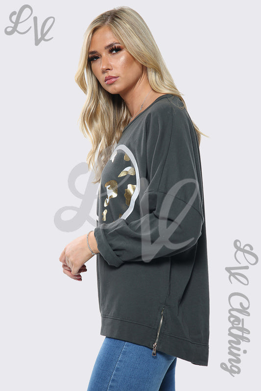 Charcoal oversized sweatshirt with gold foil heart print, side view.