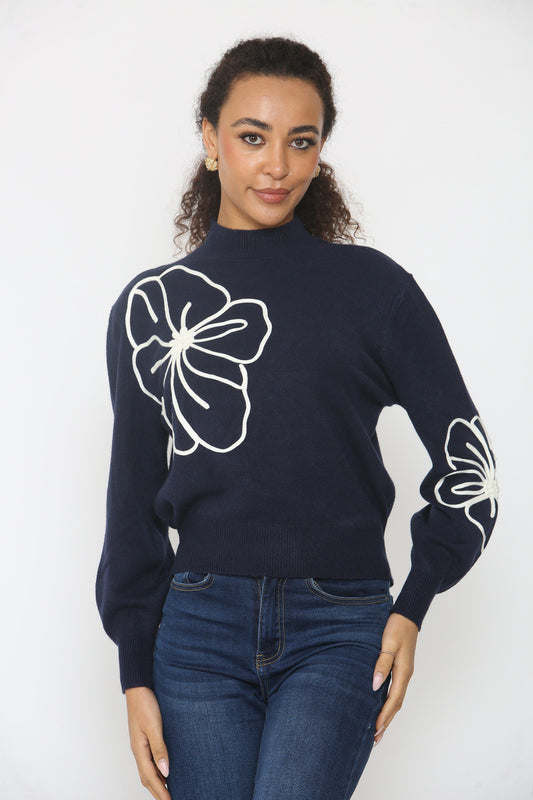 GEBREIDE TRUI MET BLOEMBORDUURSEL MARINEBLAUW