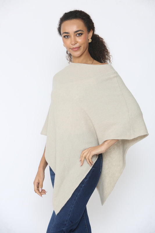 ZACHTE GEBREIDE PONCHO STEENKLEURIG