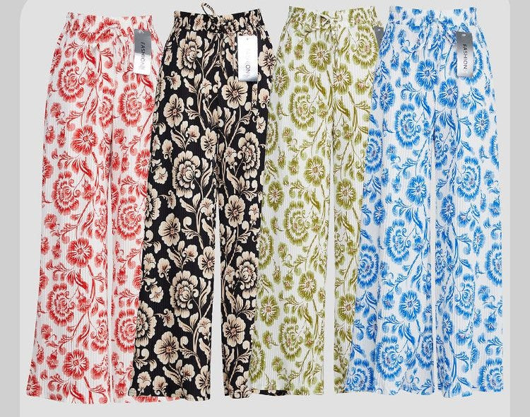 BROEK MET ELASTISCHE TAILLE, WIJDE PIJPEN, GEPLOOID EN MET BLOEMEN BAROKPRINT