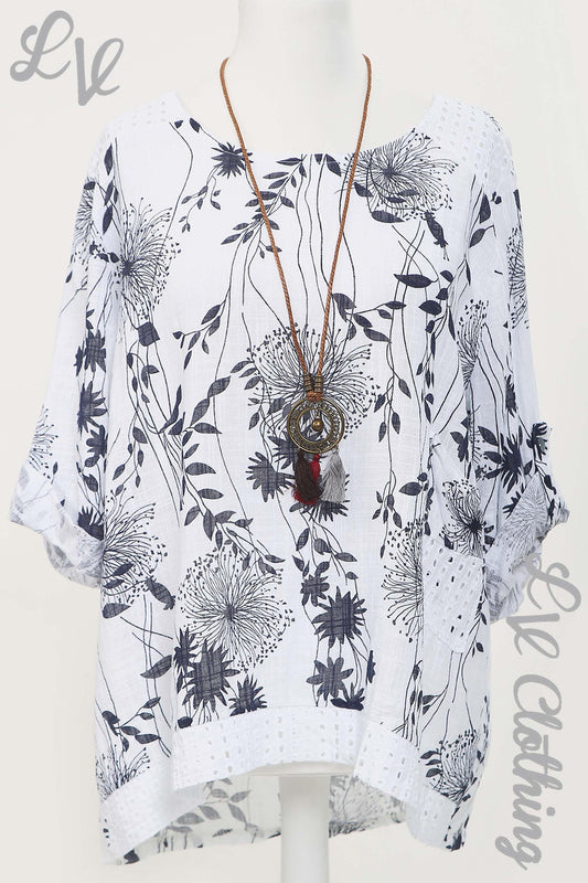 White dandelion print cut-out shoulder top with attached necklace, loose fit