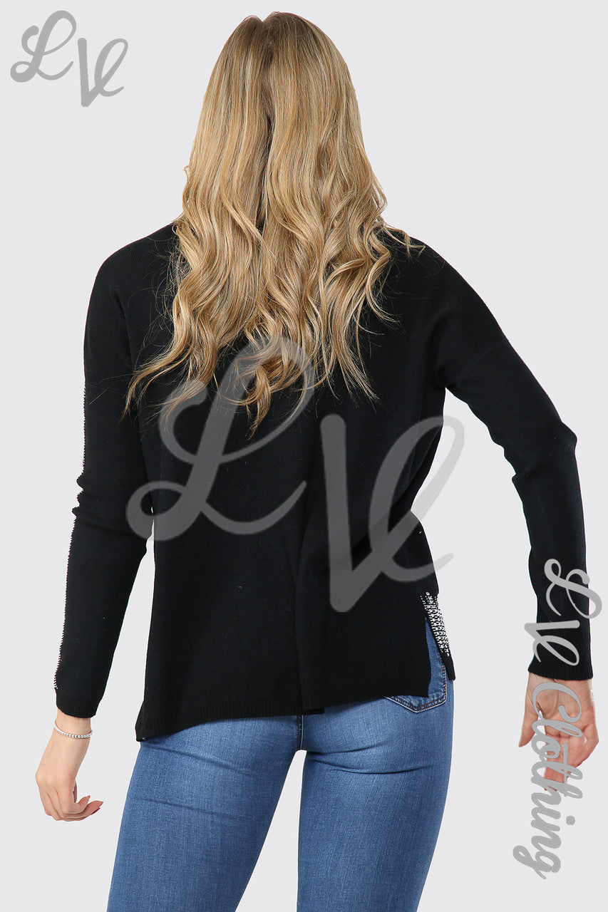 Dames trui met paillettenzoom en -mouwen zwart stukprijs €20,99