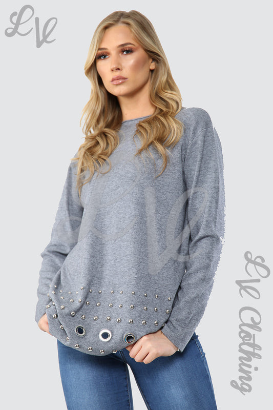Grey long-sleeve jumper with studded circle border at hem and cuffs