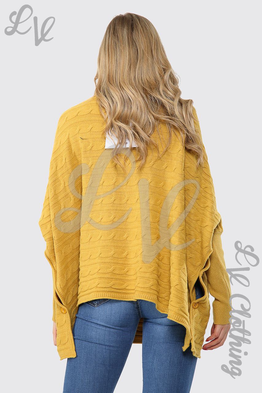 Dames coltrui met kabelpatroon en vleermuismouwen Mosterd - Prijs per stuk €17,99