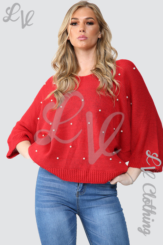 Red knit jumper with pearl detailing at front and wide neckline