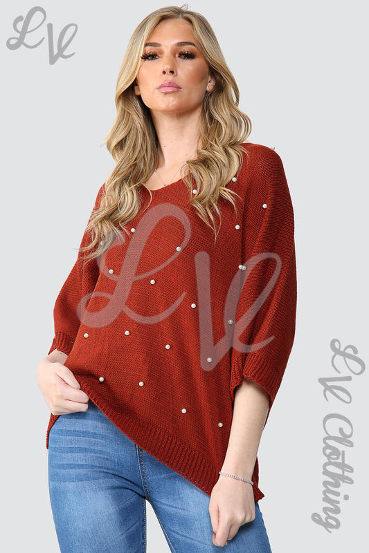 Rust knit jumper with pearl detail at front, three-quarter sleeves
