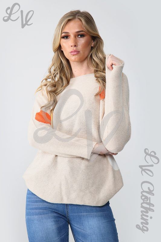 Stone fine knit jumper, orange spot detail at shoulder and sleeves, front view