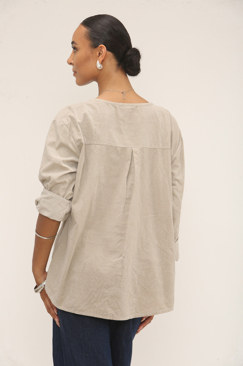 CORDUROY TOP MET INSNIJDING IN DE HALS GRIJS
