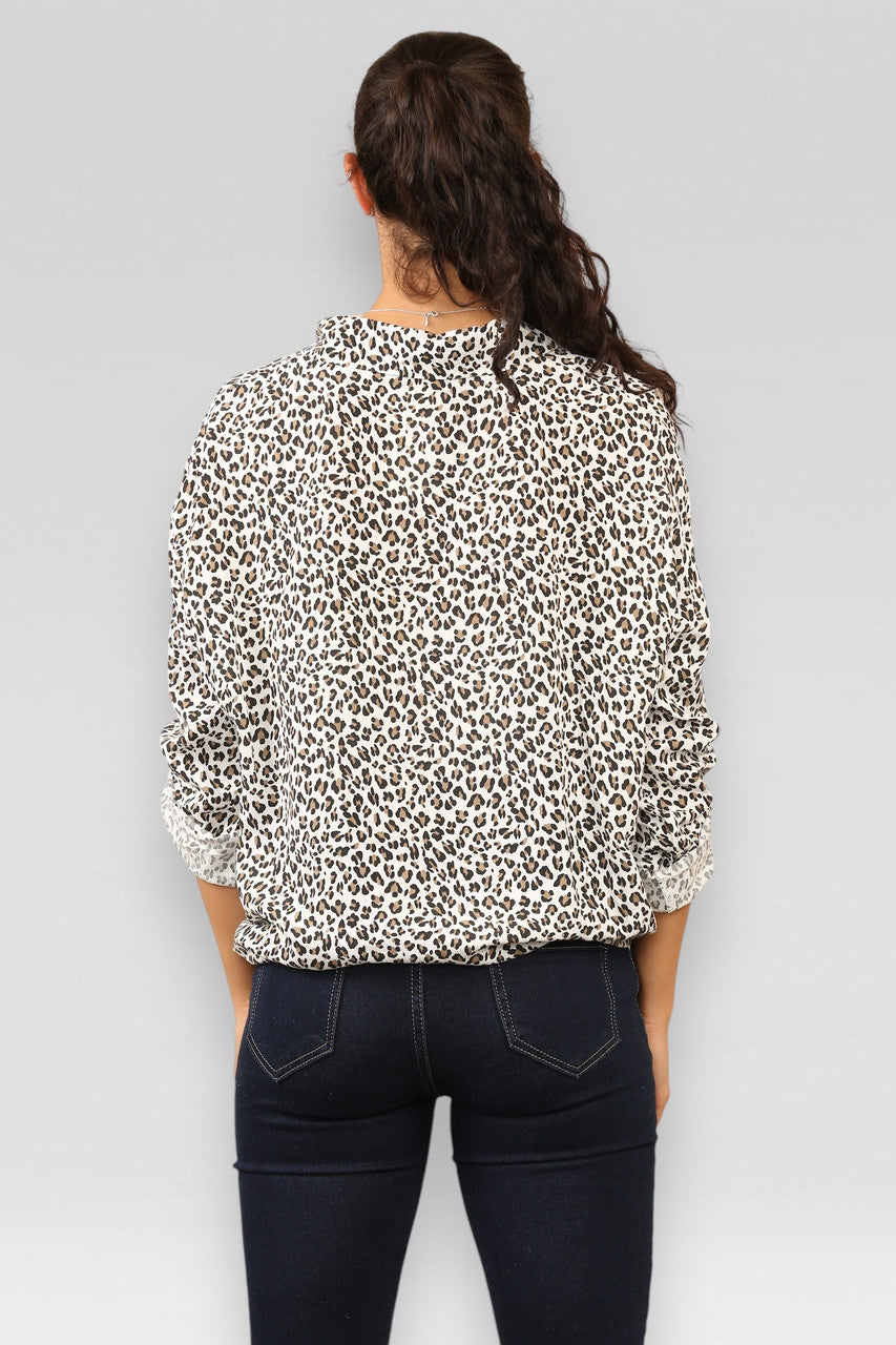 WIT BLOUSE MET PANTERPRINT EN STROPDASVOORPAND