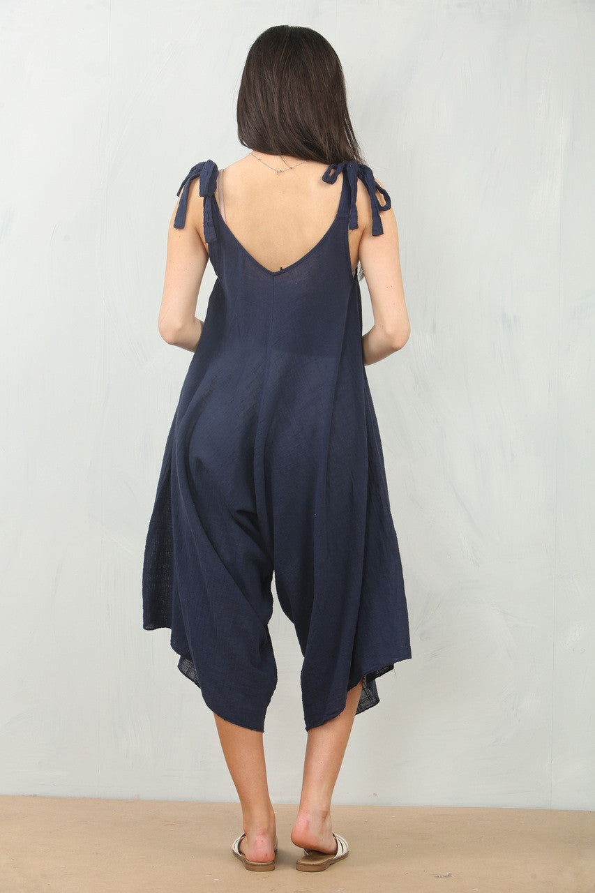 KATOENEN JUMPSUIT MET STRIK DETAILS OP DE SCHOUDERS NAVY