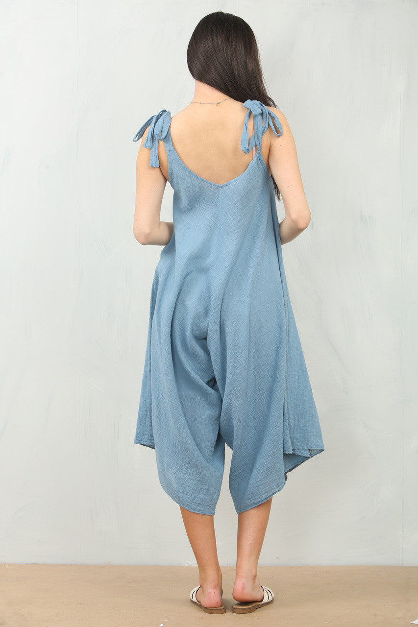 JUMPSUIT VAN KATOENKEPER MET STROPDETAIL OP DE SCHOUDERS