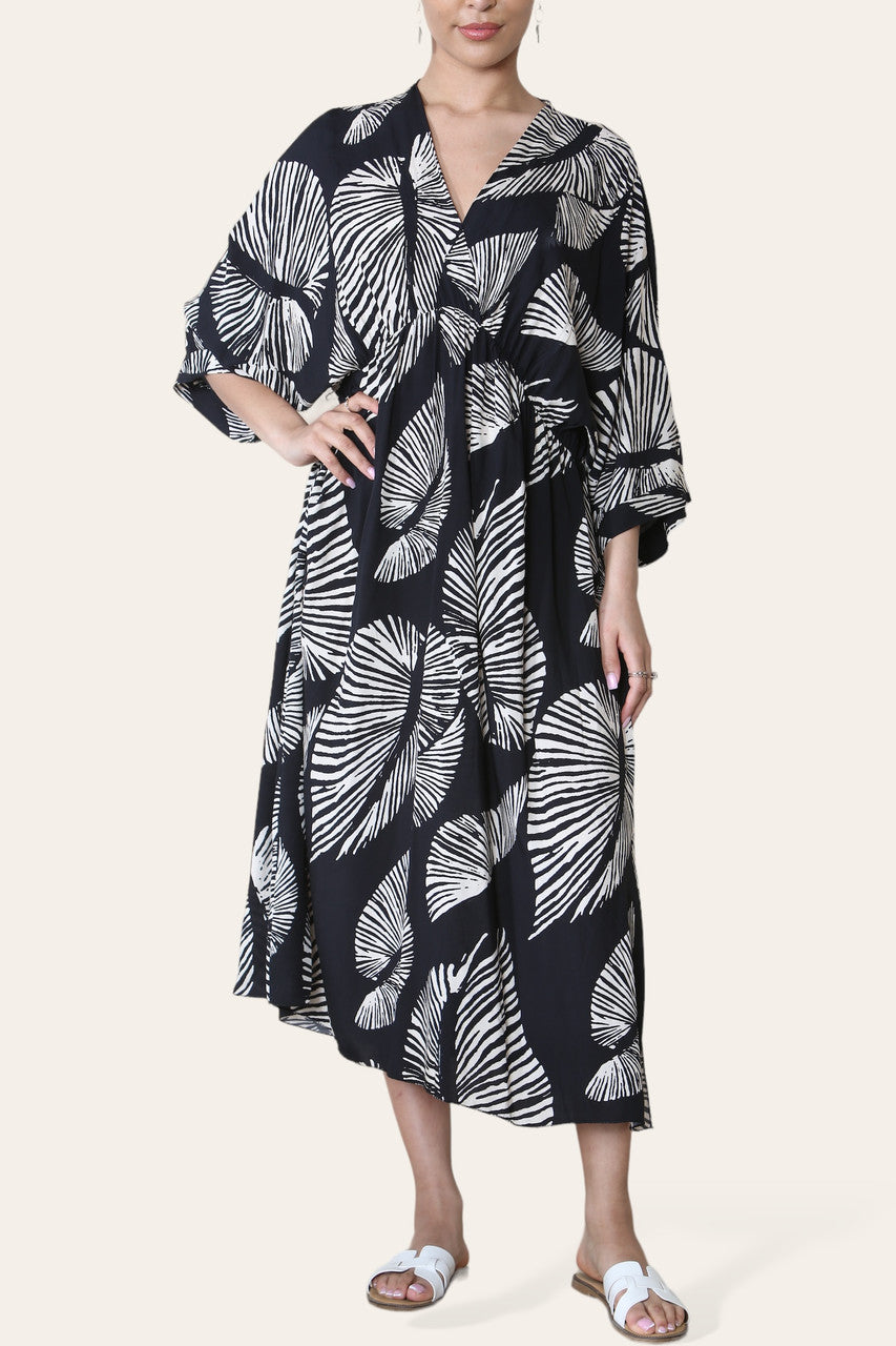 MAXI-JURK MET PALMBLAADPRINT - ZWART
