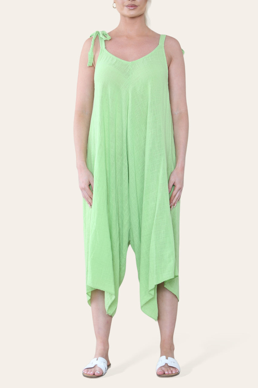 JUMPSUIT VAN KATOEN MET STROPDETAIL OP DE SCHOUDERS LIMOENGROEN