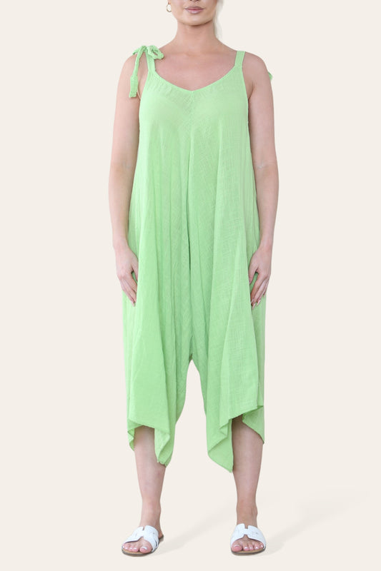 JUMPSUIT VAN KATOEN MET STROPDETAIL OP DE SCHOUDERS LIMOENGROEN