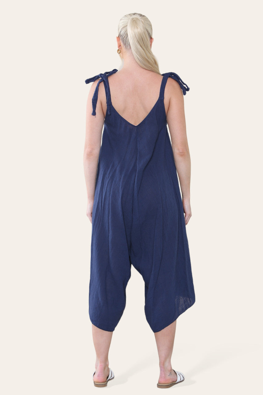 KATOENEN JUMPSUIT MET STRIK DETAILS OP DE SCHOUDERS NAVY