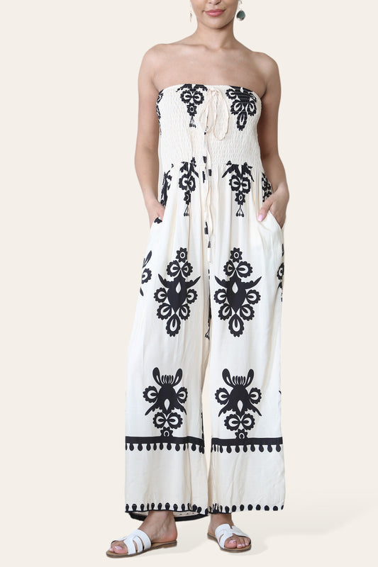 BANDAU JUMPSUIT MET PLOOITJES EN PRINT CRÈME
