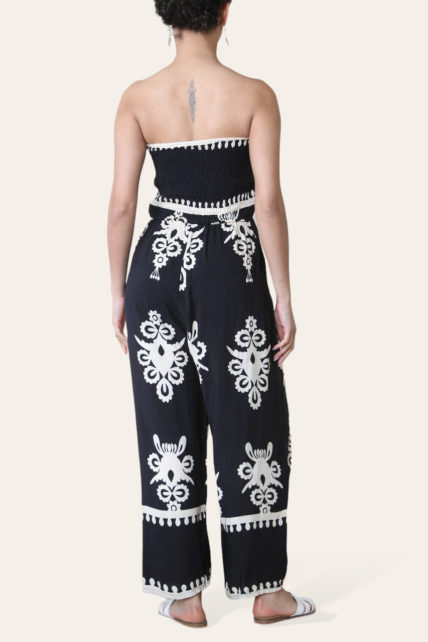 BANDEAU GECREPPT BEDRUKT JUMPSUIT ZWART