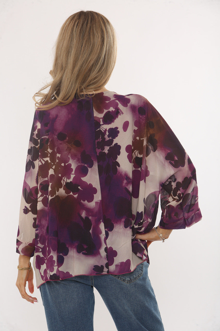 BLOUSE MET ABSTRACTE BLADPRINT PAARS