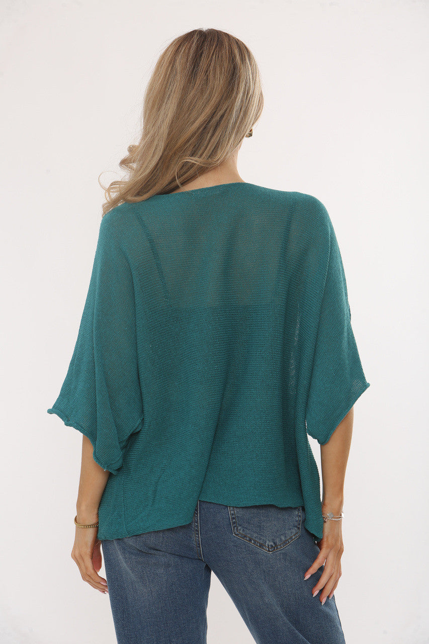 GEBREIDE BATWING TOP MET MOUWEN - AQUAMARIJN