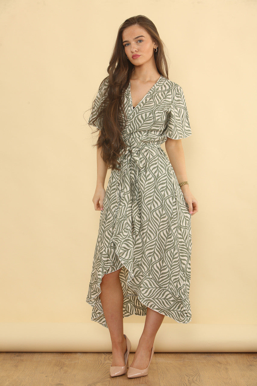 JURK MET OVERSLAGMODEL EN ABSTRACTE BLADERENPRINT - KHAKI