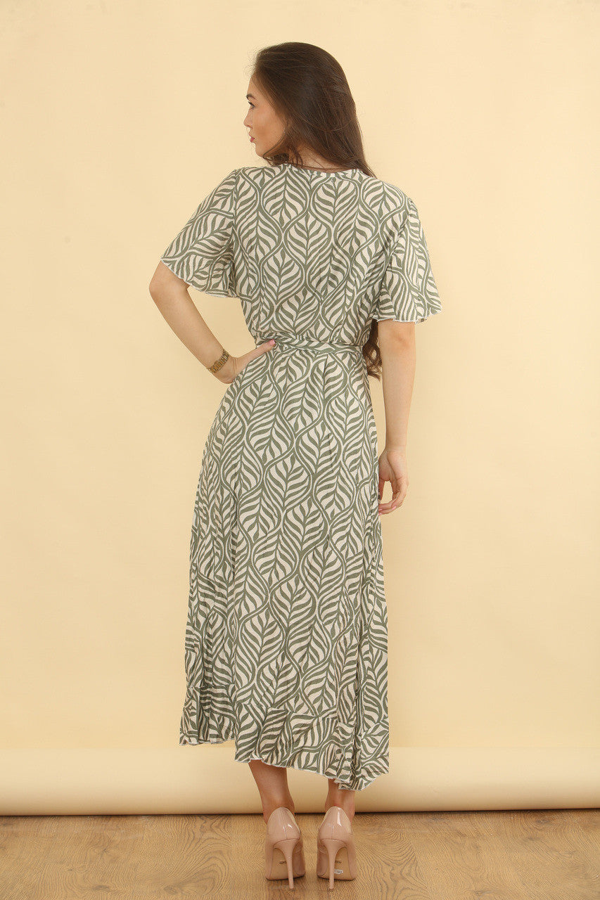 JURK MET OVERSLAGMODEL EN ABSTRACTE BLADERENPRINT - KHAKI
