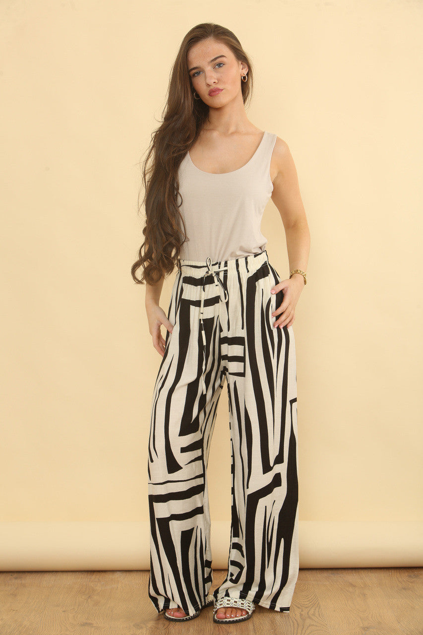 BROEK MET GEOMETRISCHE PRINT - ZWART