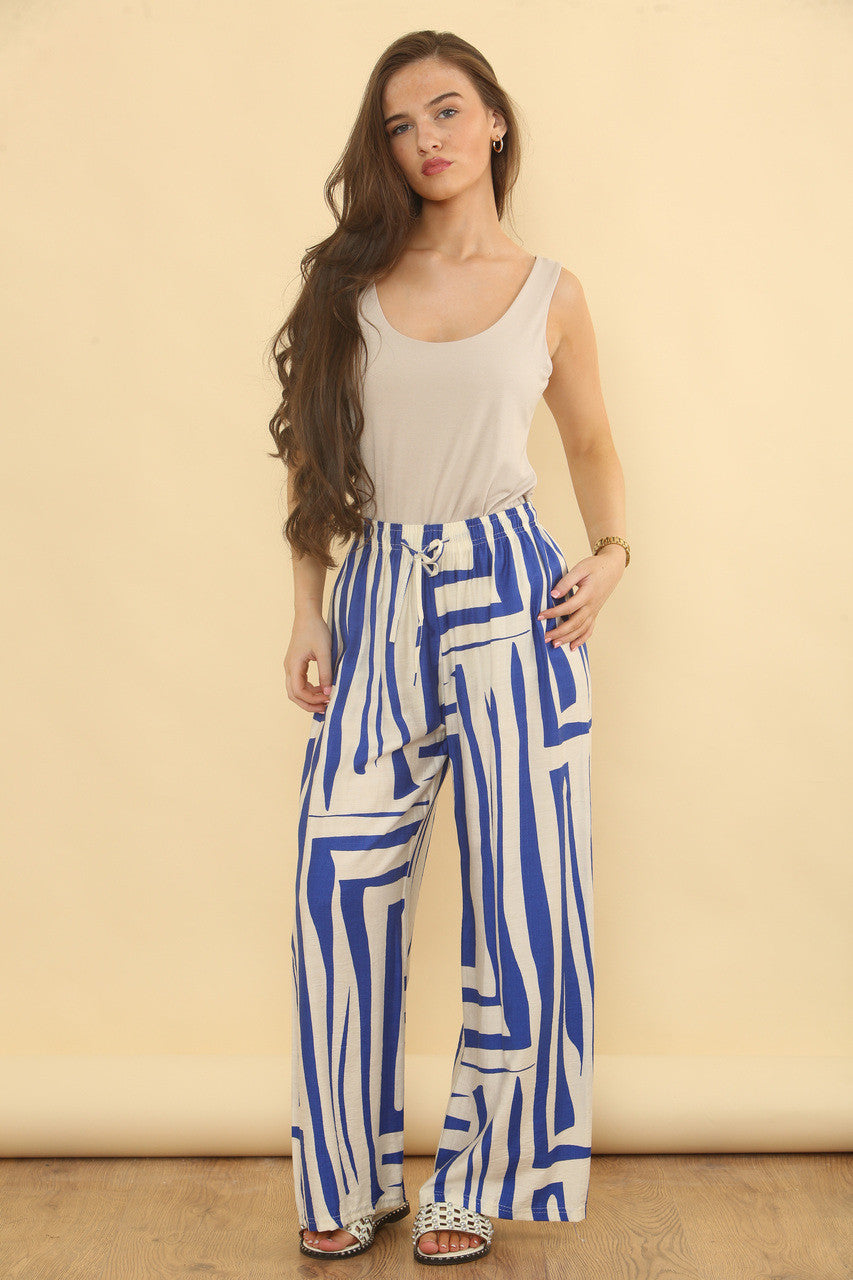 BROEK MET GEOMETRISCHE PRINT - BLAUW