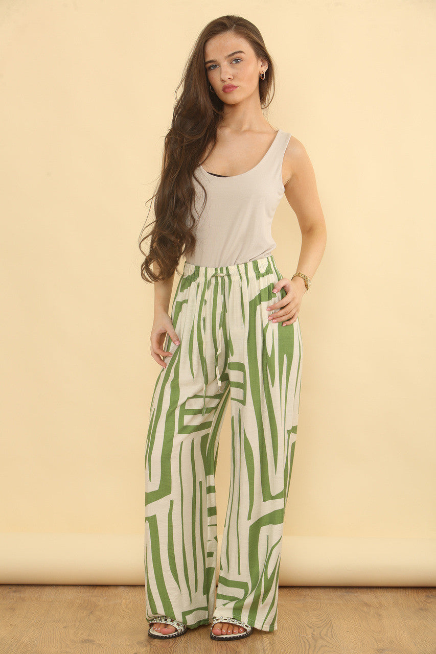 BROEK MET GEOMETRISCHE PRINT - GROEN