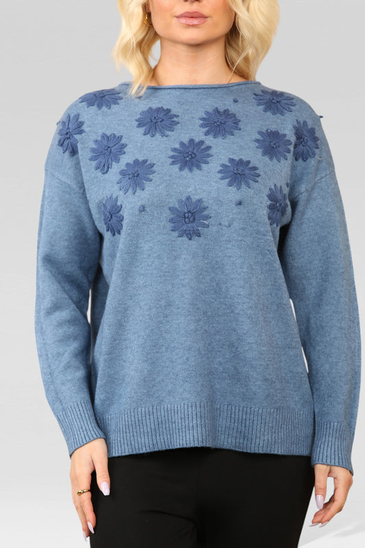GEBREIDE TRUI MET GEBORDUURDE BLOEMENSPARKELTJE MET DENIM