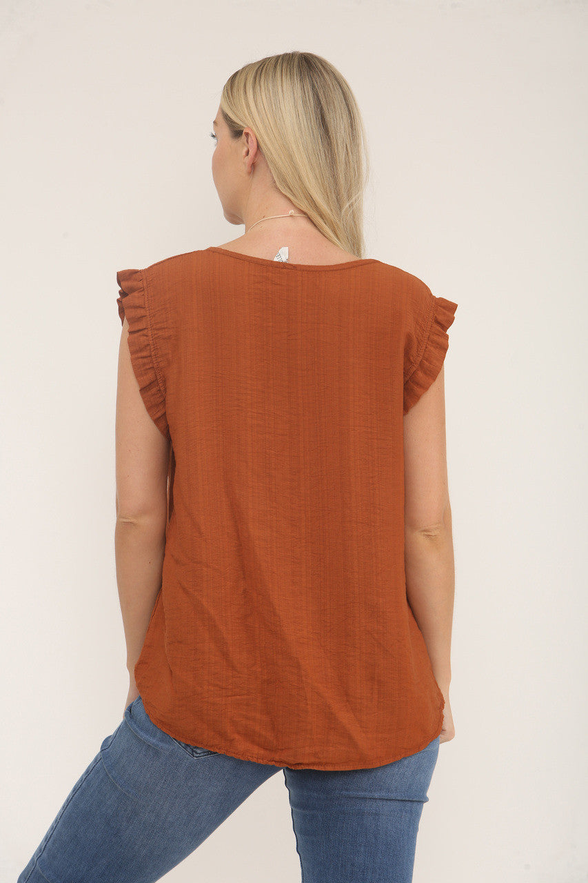 Rust textured sleeveless back view with ruffle sleeves