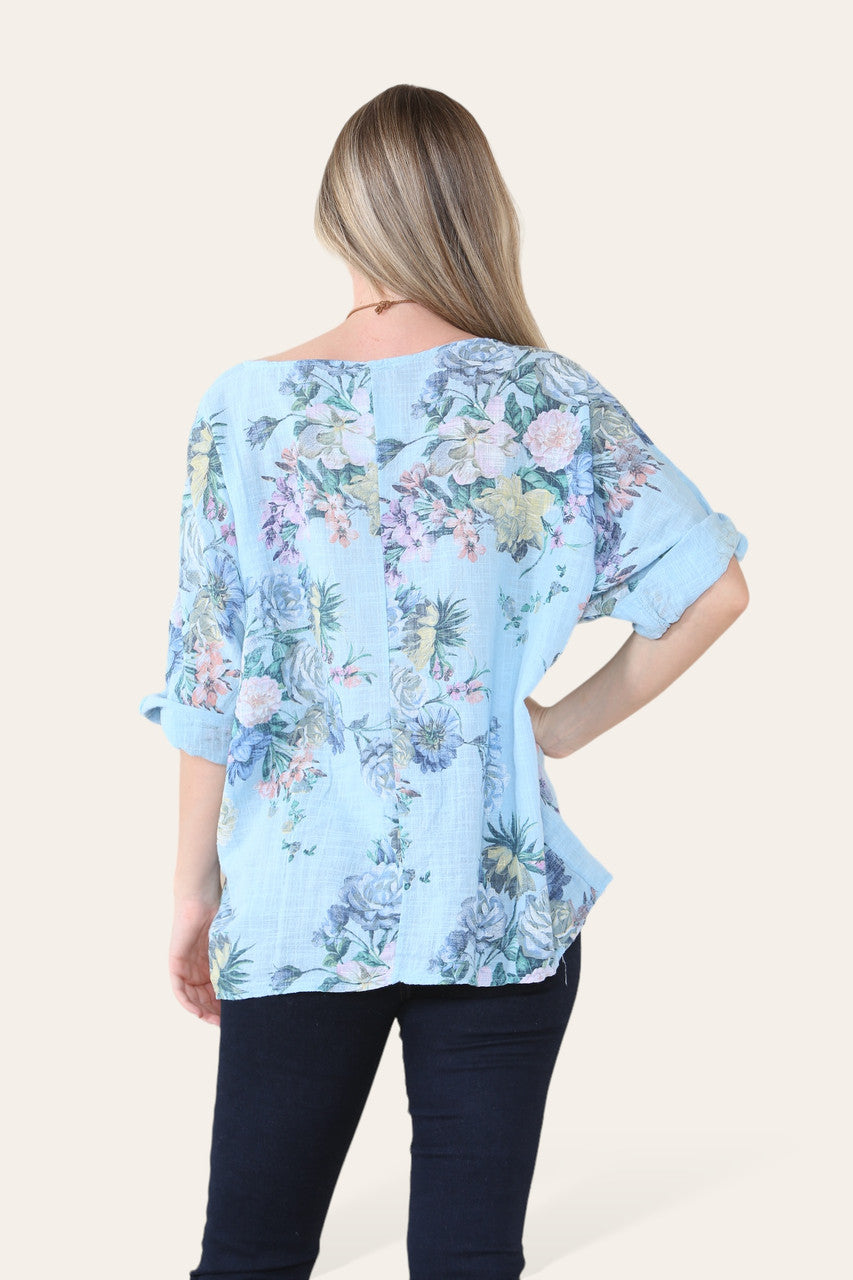 FADED FLORAL BOUQUET PRINT TOP LIGHT BLUE