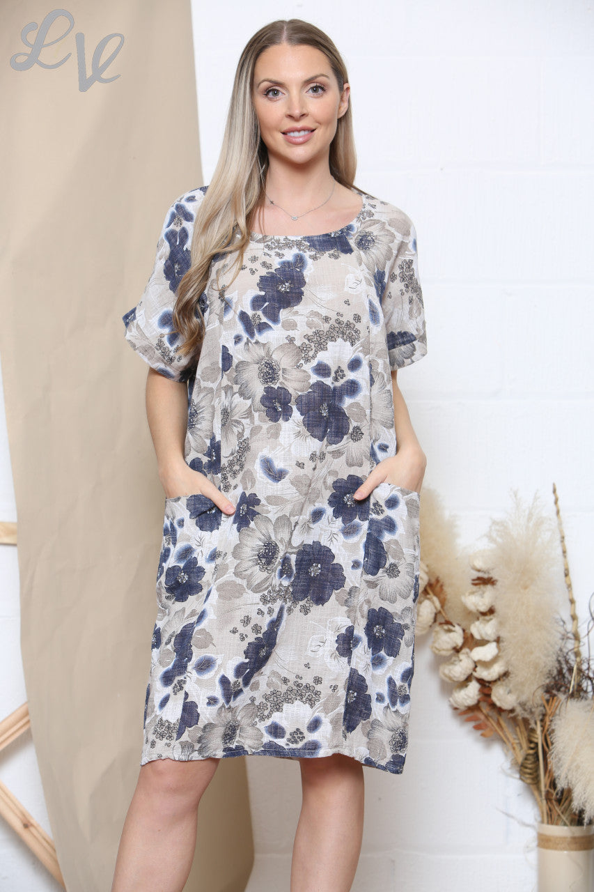 Damesjurk met bloemenprint, zakken en steenkleur