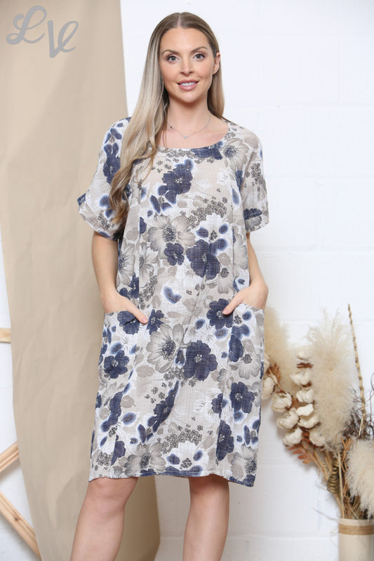 Damesjurk met bloemenprint, zakken en steenkleur