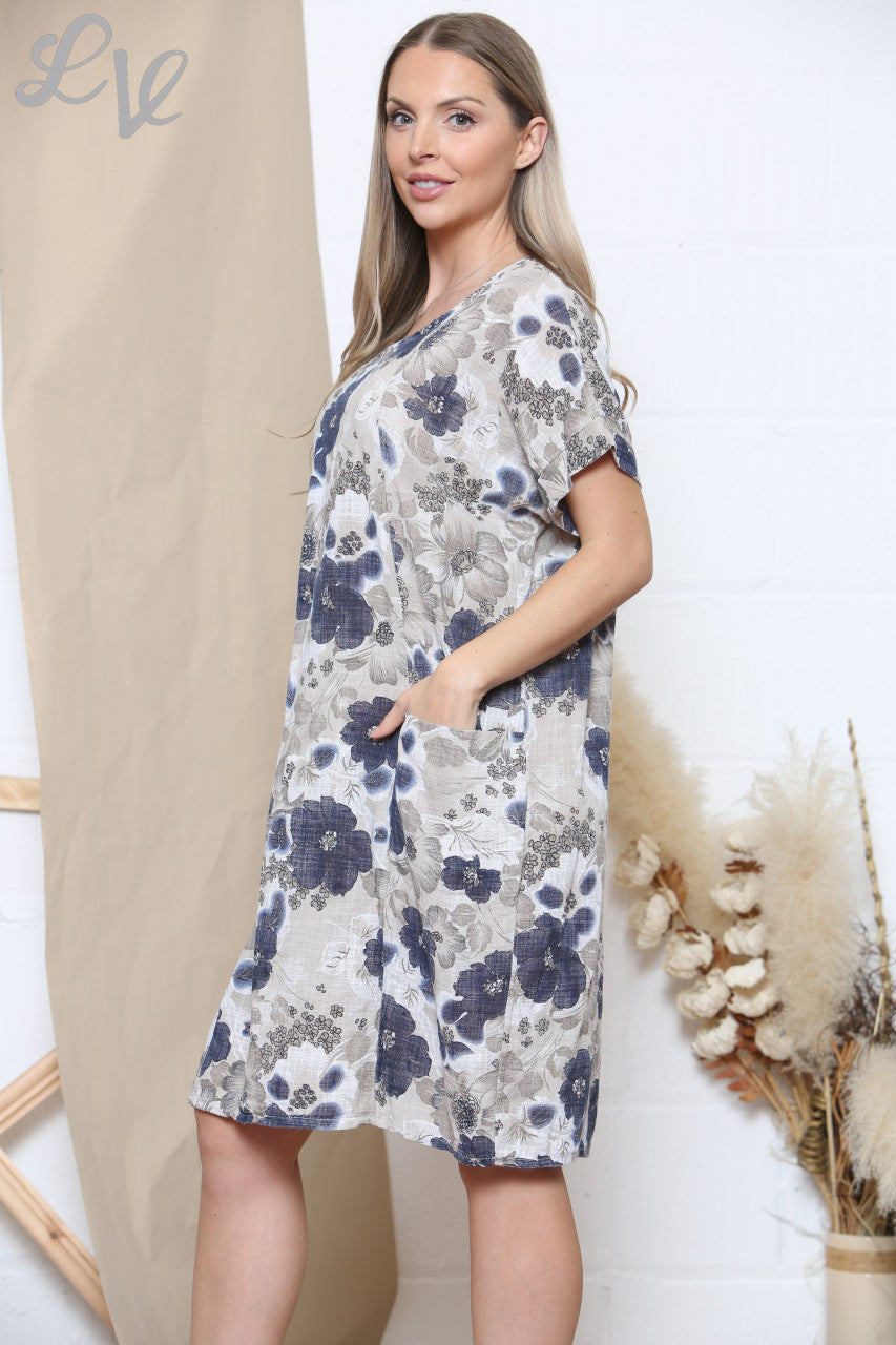 Damesjurk met bloemenprint, zakken en steenkleur