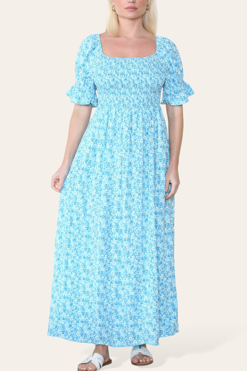 MAXIJURK MET BLOEMENDESSIN EN BARDOT-HALS TURQUOISE