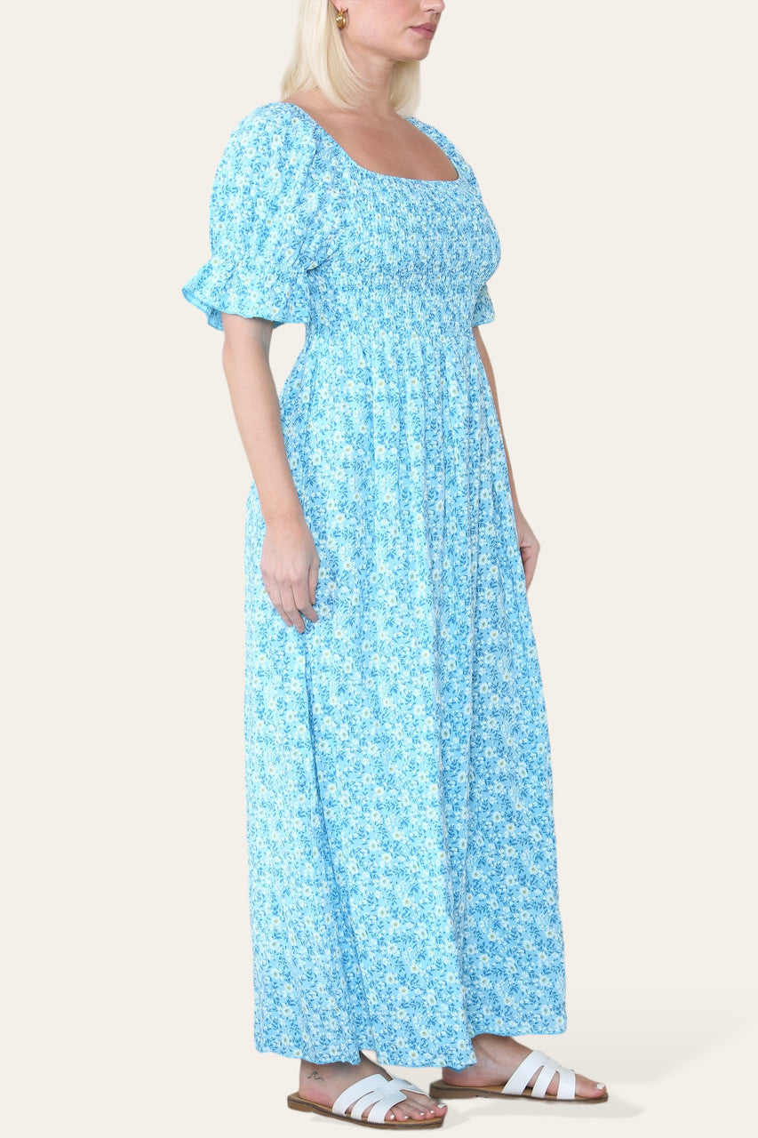 MAXIJURK MET BLOEMENDESSIN EN BARDOT-HALS TURQUOISE