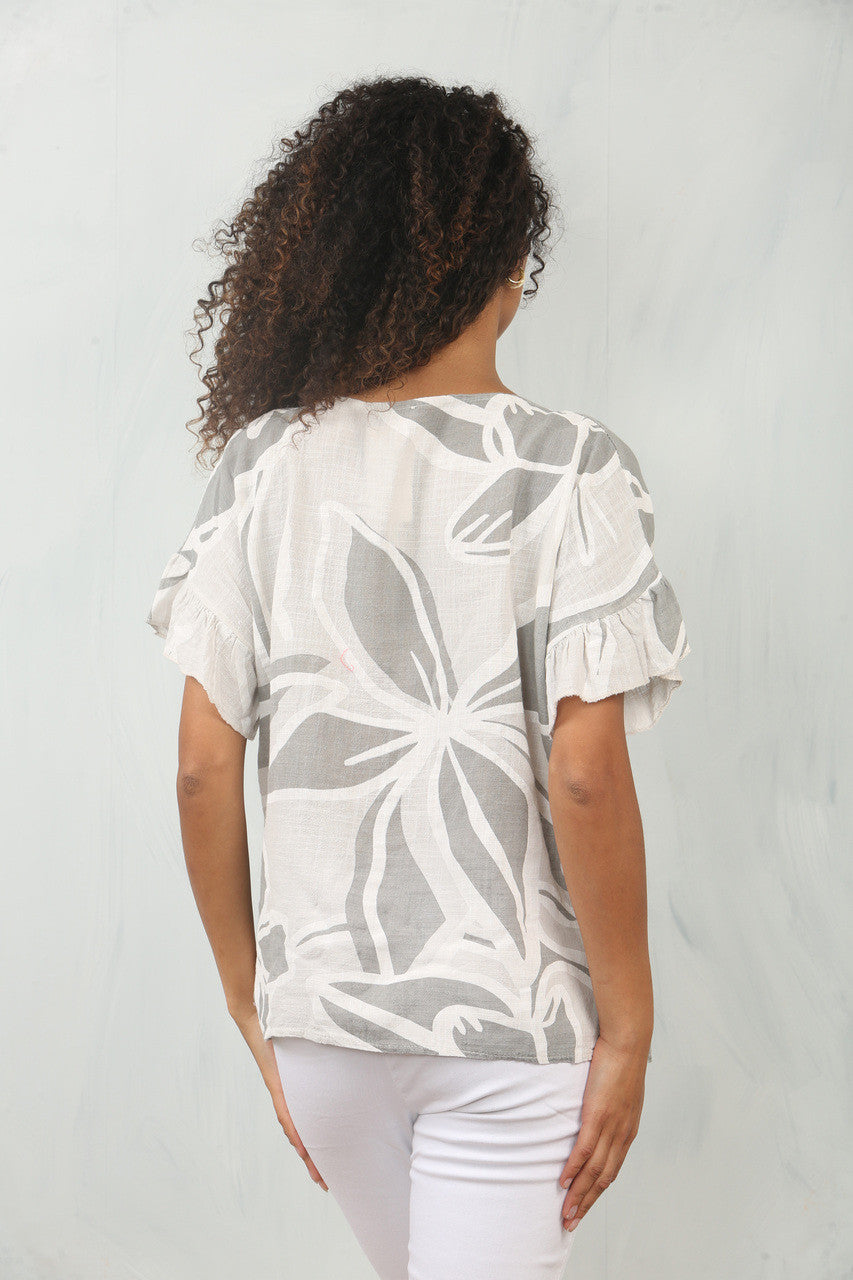 BLOEM ABSTRACTE PRINT TOP MET RUFFELMOUW ZILVER