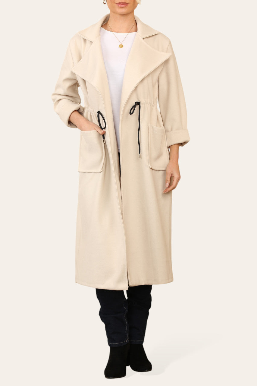 OVERSIZED JAS MET TREKKOORD IN DE TAILLE BEIGE