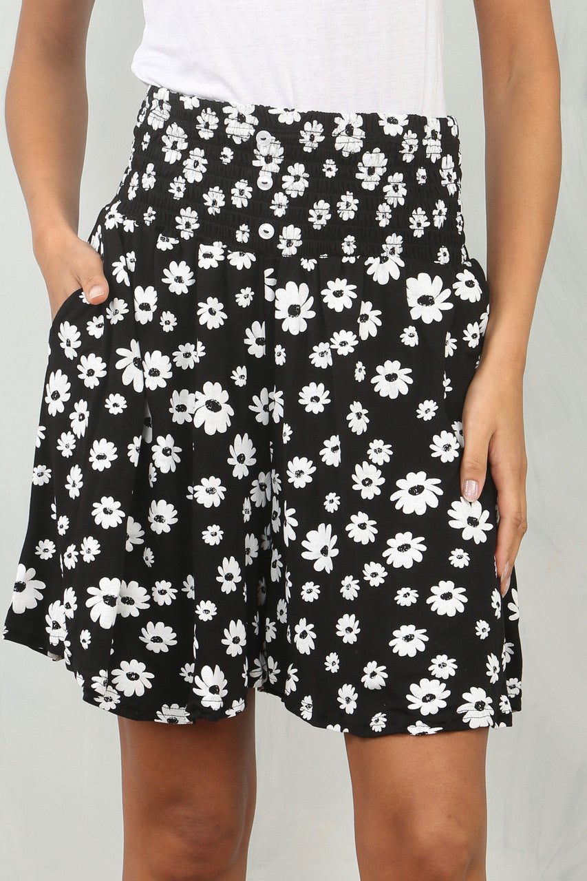 ZWART GEBLOEMDE DAISY-SKORT MET ELASTISCHE TAILLEBAND