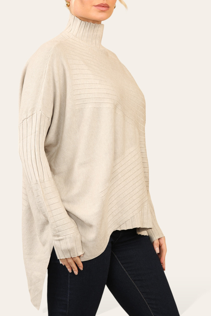 RIBBED ASYMMETRICAL HIGH NECK JUMPER STONE