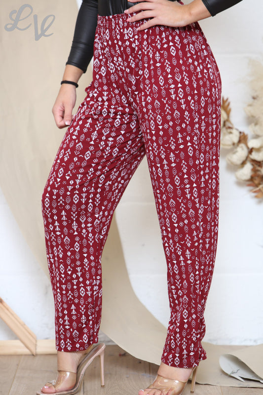 Damesbroek met tribalprint en geometrische figuren, rood