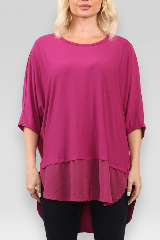 DOORZICHTIGE TOP MET SPLIT IN MAGENTA