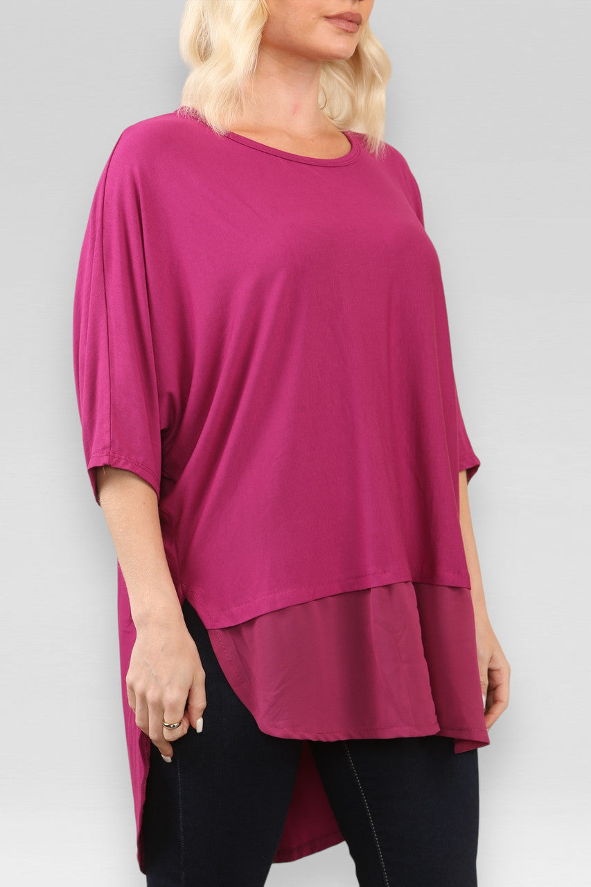 DOORZICHTIGE TOP MET SPLIT IN MAGENTA