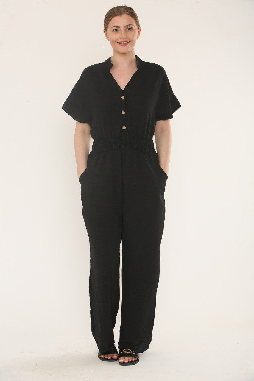 JUMPSUIT MET KORTE MOUWEN EN ELASTISCHE TAILLEBAND - ZWART