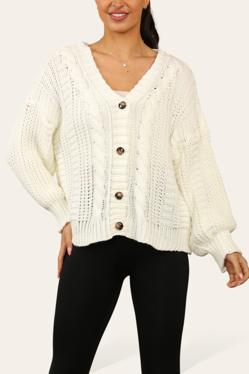 KABELGEBREIDE CARDIGAN MET KNOPEN CRÈME