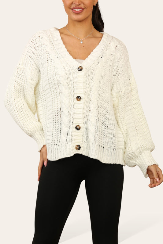 KABELGEBREIDE CARDIGAN MET KNOPEN CRÈME