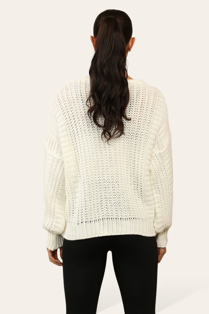 KABELGEBREIDE CARDIGAN MET KNOPEN CRÈME