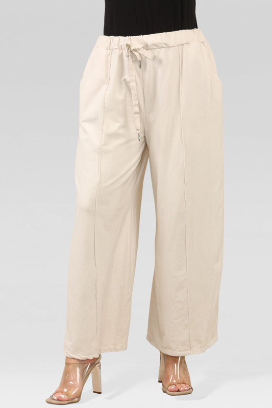 JOGGINGBROEK MET WIJDE PIJPEN STEENKLEUR
